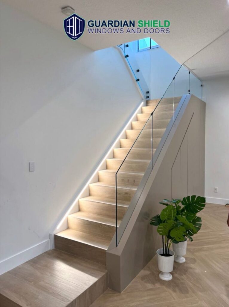 gs wood staircase with glass handrails