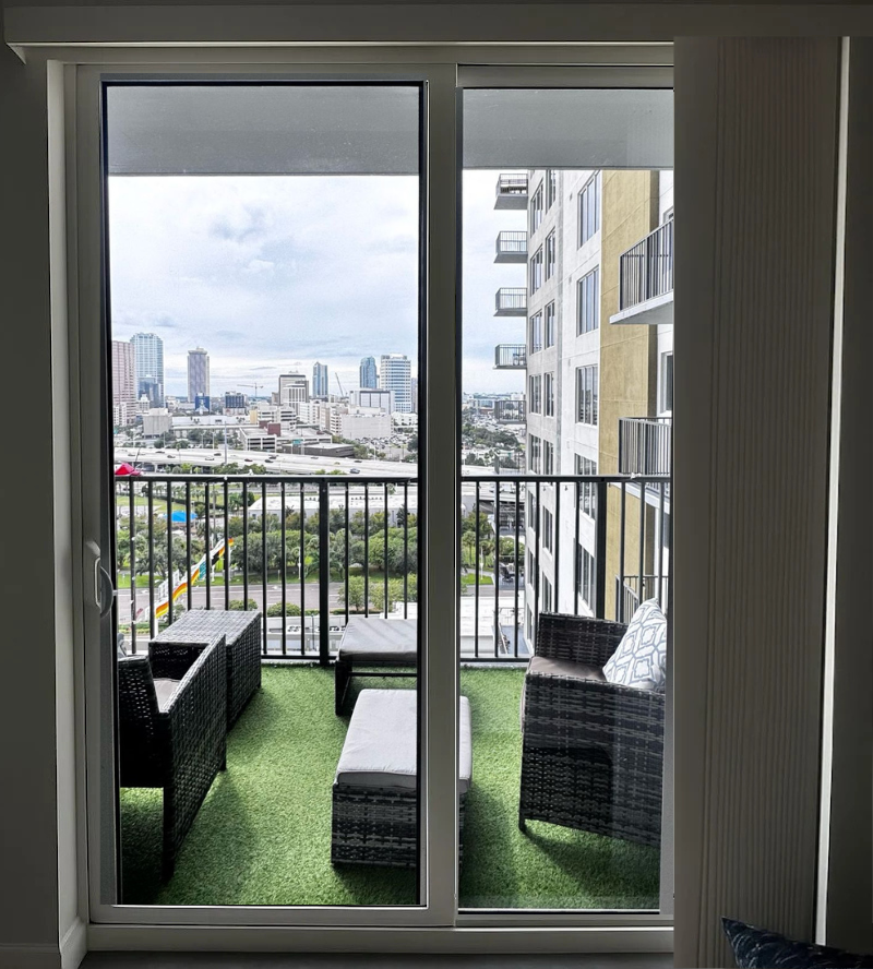 Sliding doors showing balcony and city view