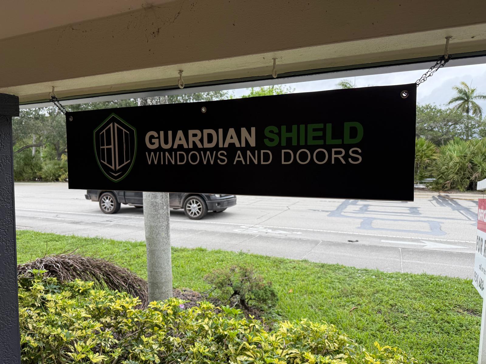 Guardian Shield Windows and Doors street sign along Griffin Road in Davie, Florida