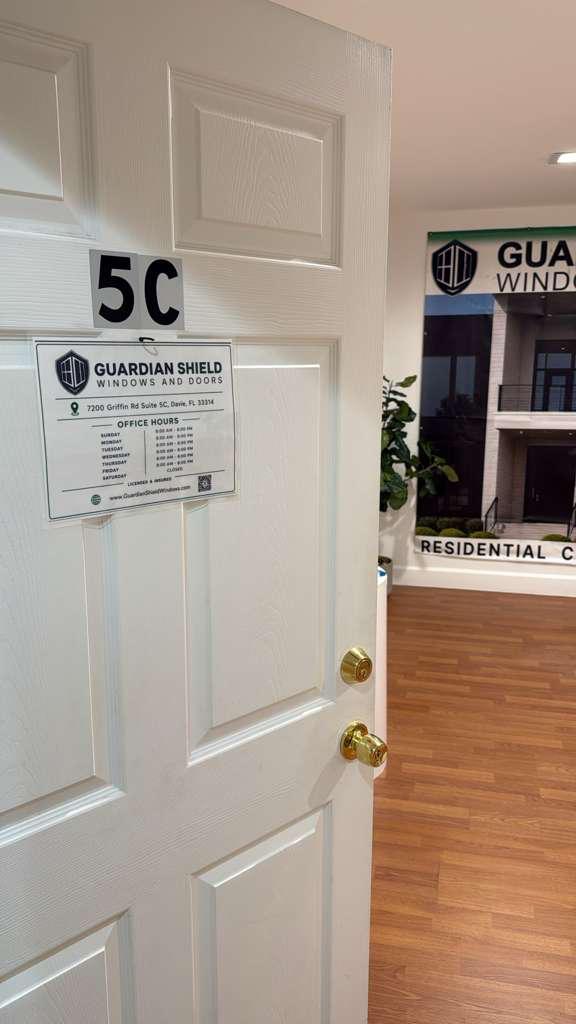 Suite 5C entrance and posted office hours for Guardian Shield Windows and Doors in Davie, FL